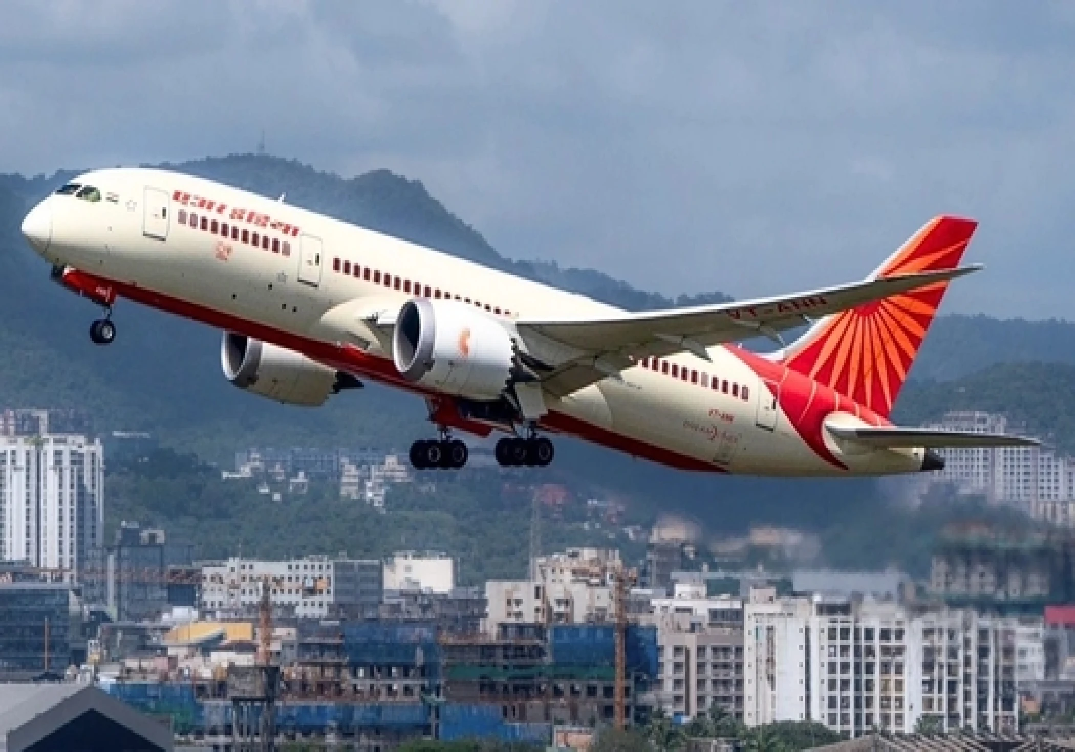 Air India Mid-Flight Scare: Cabin Crew Collapses, Passengers Fall Ill Due to Suspected Food Poisoning